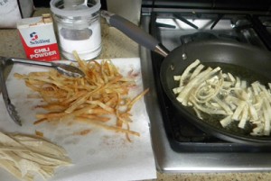 frying tortillas