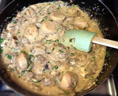 add back scallops and mushrooms